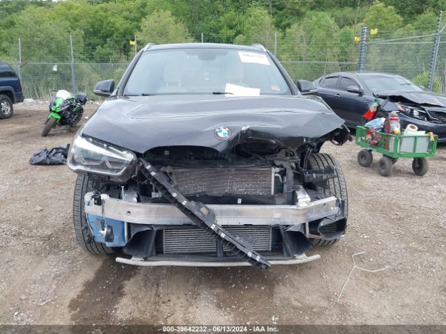 Photo 5 VIN: WBXHT3C33H5F77899 - BMW X1 