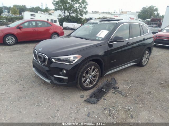 Photo 1 VIN: WBXHT3C33H5F78549 - BMW X1 