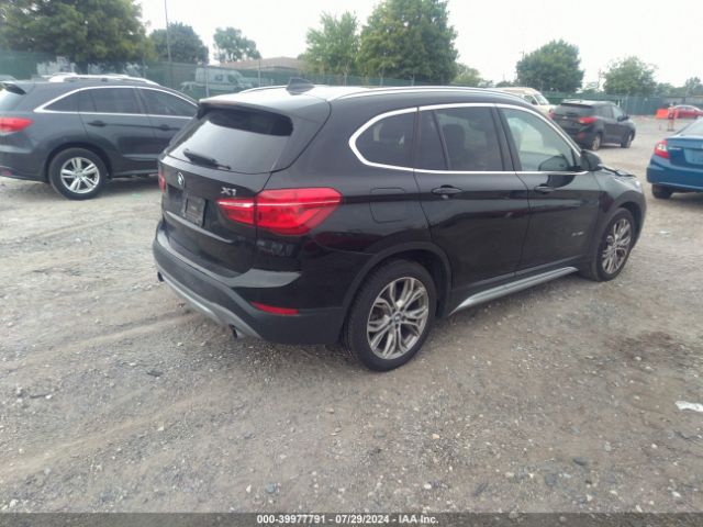 Photo 3 VIN: WBXHT3C33H5F78549 - BMW X1 