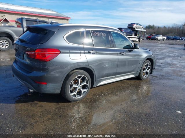 Photo 3 VIN: WBXHT3C33H5F79510 - BMW X1 