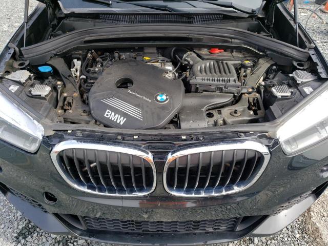 Photo 11 VIN: WBXHT3C33J3F03786 - BMW X1 