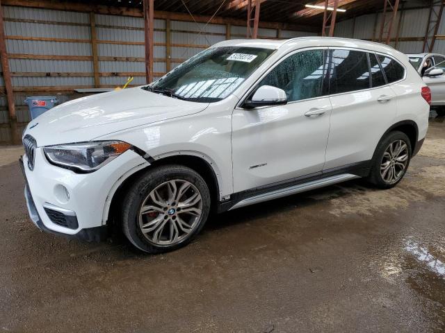 Photo 0 VIN: WBXHT3C33J5F89380 - BMW X1 