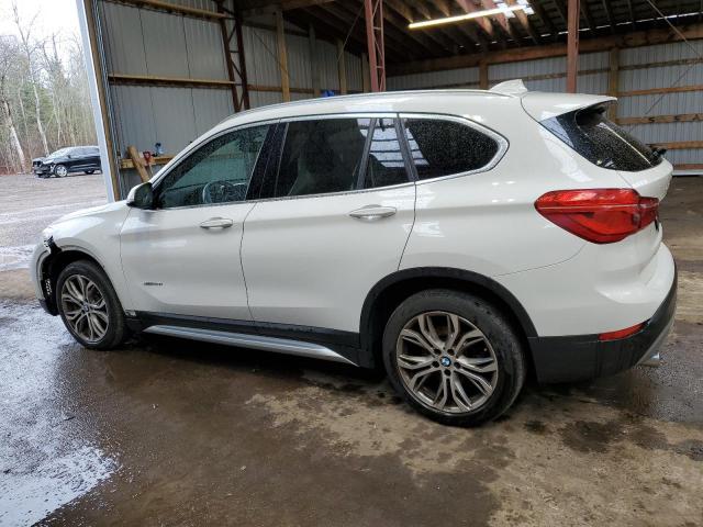 Photo 1 VIN: WBXHT3C33J5F89380 - BMW X1 