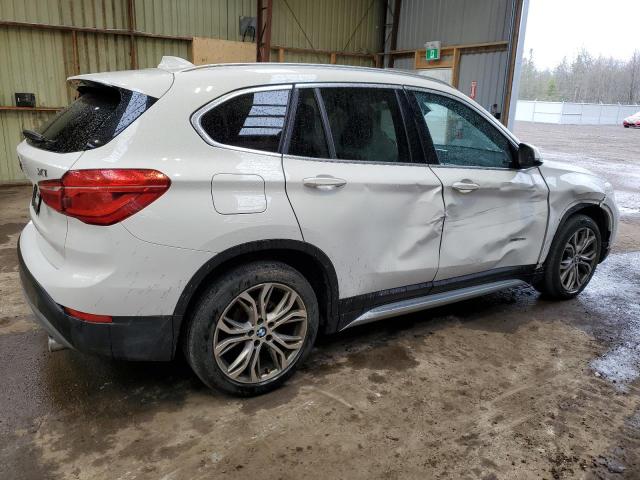 Photo 2 VIN: WBXHT3C33J5F89380 - BMW X1 