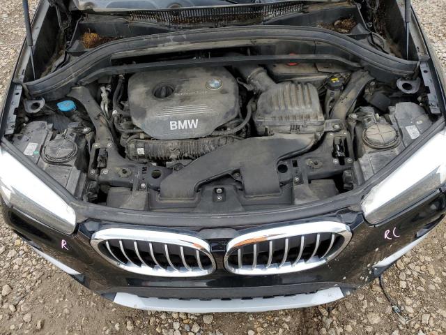 Photo 11 VIN: WBXHT3C33J5F89900 - BMW X1 