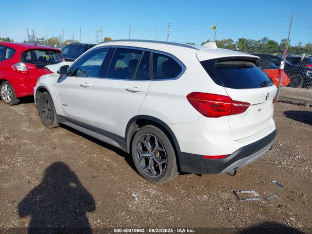 Photo 2 VIN: WBXHT3C33J5F90173 - BMW X1 