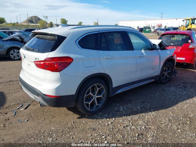 Photo 3 VIN: WBXHT3C33J5F90173 - BMW X1 