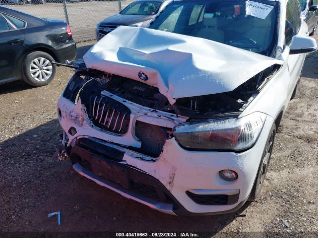 Photo 5 VIN: WBXHT3C33J5F90173 - BMW X1 