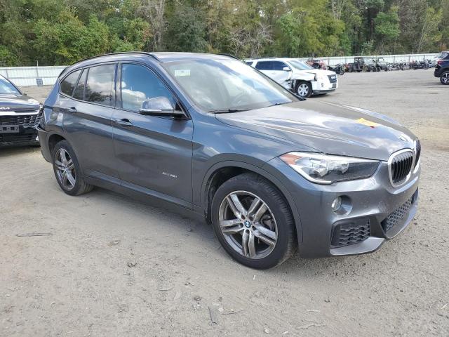 Photo 3 VIN: WBXHT3C33J5F93316 - BMW X1 