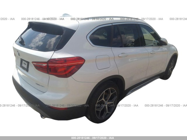 Photo 3 VIN: WBXHT3C33J5L33642 - BMW X1 