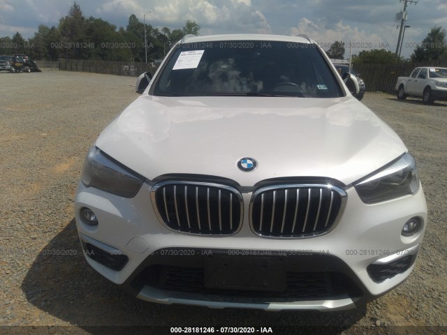 Photo 5 VIN: WBXHT3C33J5L33642 - BMW X1 