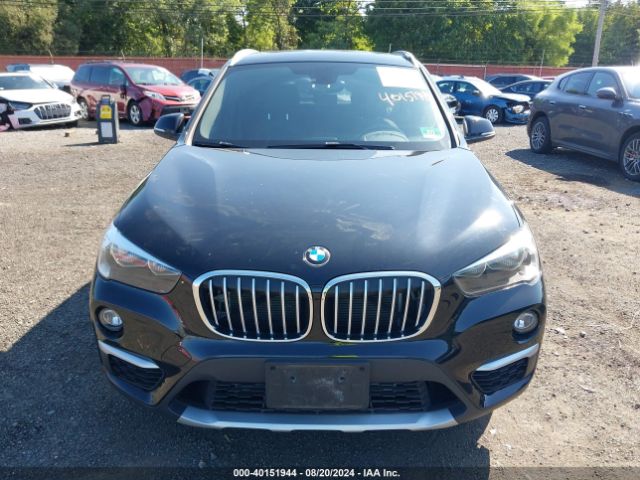 Photo 5 VIN: WBXHT3C33J5L33737 - BMW X1 