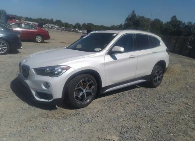 Photo 1 VIN: WBXHT3C33J5L34046 - BMW X1 