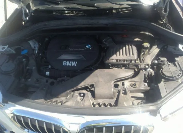 Photo 9 VIN: WBXHT3C33J5L34046 - BMW X1 