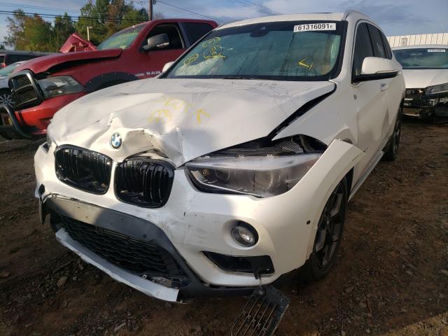 Photo 8 VIN: WBXHT3C34G5E47158 - BMW X1 XDRIVE2 