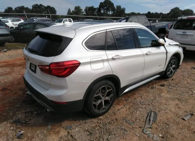 Photo 3 VIN: WBXHT3C34G5E47385 - BMW X1 