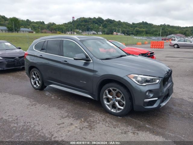 Photo 0 VIN: WBXHT3C34G5E49914 - BMW X1 