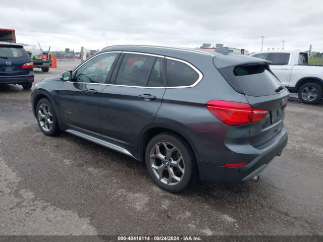 Photo 2 VIN: WBXHT3C34G5E49914 - BMW X1 