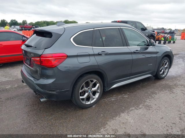 Photo 3 VIN: WBXHT3C34G5E49914 - BMW X1 