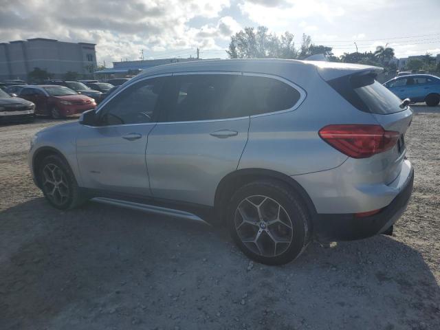 Photo 1 VIN: WBXHT3C34G5E50626 - BMW X1 