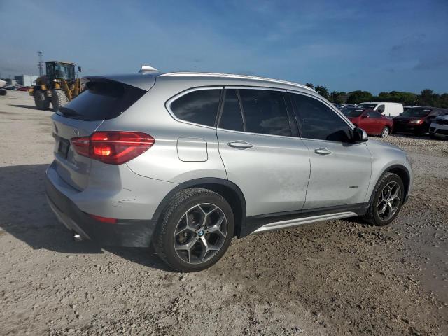 Photo 2 VIN: WBXHT3C34G5E50626 - BMW X1 