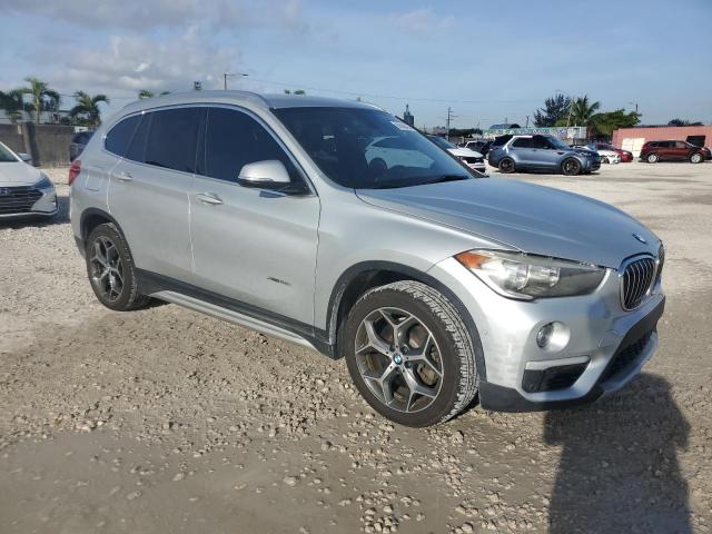 Photo 3 VIN: WBXHT3C34G5E50626 - BMW X1 