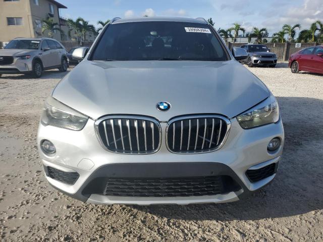 Photo 4 VIN: WBXHT3C34G5E50626 - BMW X1 