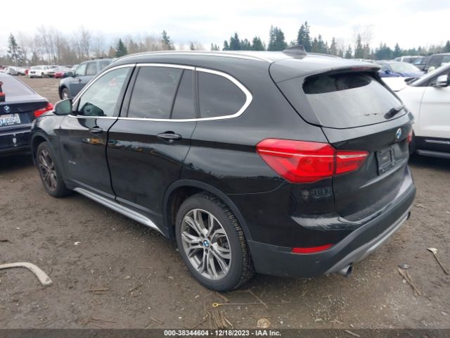 Photo 2 VIN: WBXHT3C34G5E50674 - BMW X1 