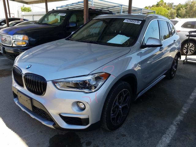 Photo 1 VIN: WBXHT3C34G5E54711 - BMW X1 XDRIVE2 