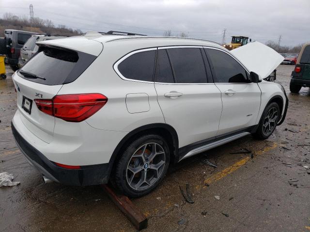 Photo 2 VIN: WBXHT3C34G5E55891 - BMW X1 