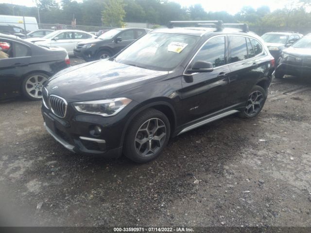 Photo 1 VIN: WBXHT3C34GP880285 - BMW X1 