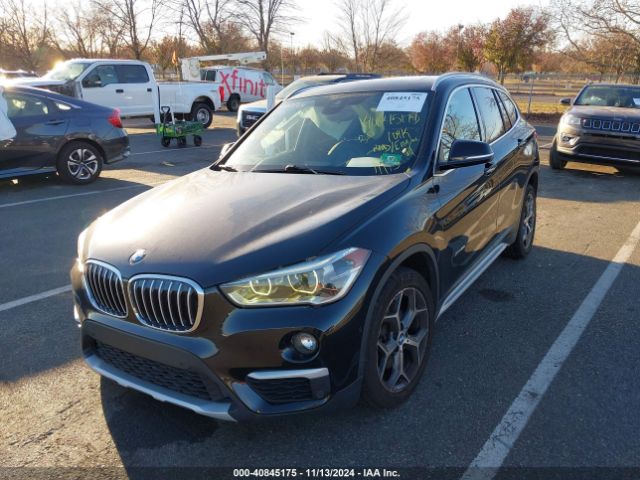 Photo 1 VIN: WBXHT3C34GP884787 - BMW X1 