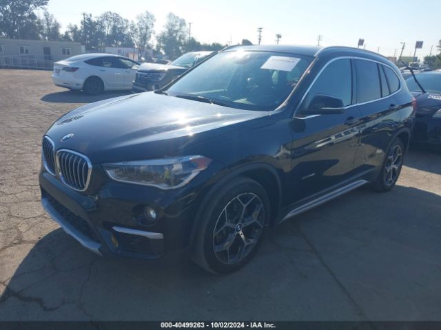 Photo 1 VIN: WBXHT3C34GP887222 - BMW X1 