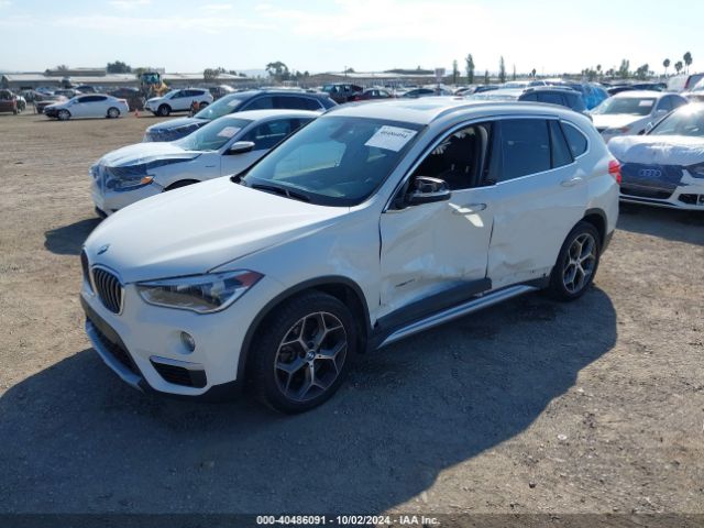 Photo 1 VIN: WBXHT3C34GP889973 - BMW X1 