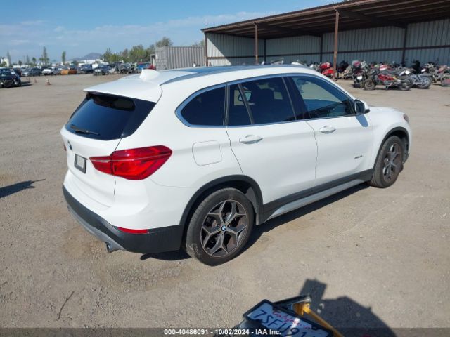 Photo 3 VIN: WBXHT3C34GP889973 - BMW X1 