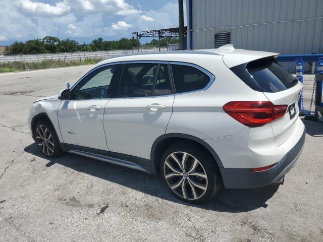 Photo 1 VIN: WBXHT3C34H5F67950 - BMW X1 