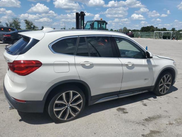 Photo 2 VIN: WBXHT3C34H5F67950 - BMW X1 