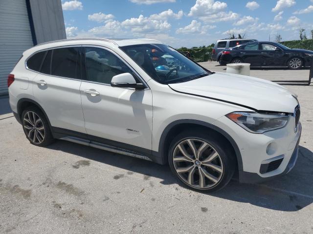 Photo 3 VIN: WBXHT3C34H5F67950 - BMW X1 