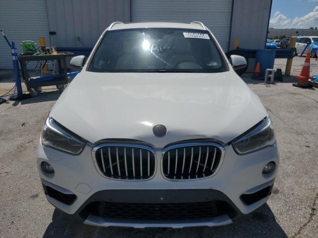 Photo 4 VIN: WBXHT3C34H5F67950 - BMW X1 