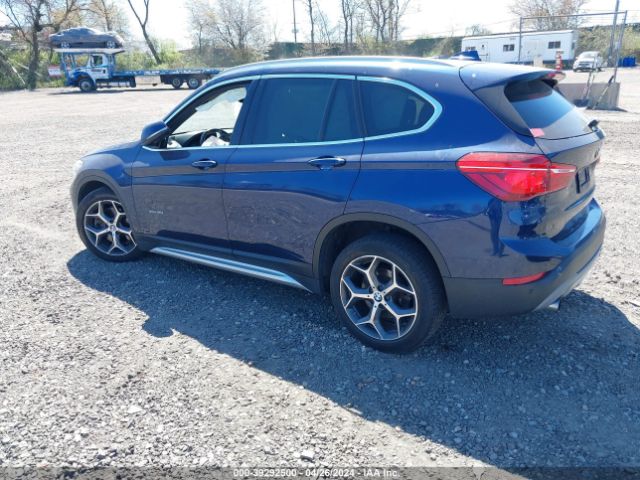 Photo 2 VIN: WBXHT3C34H5F74056 - BMW X1 