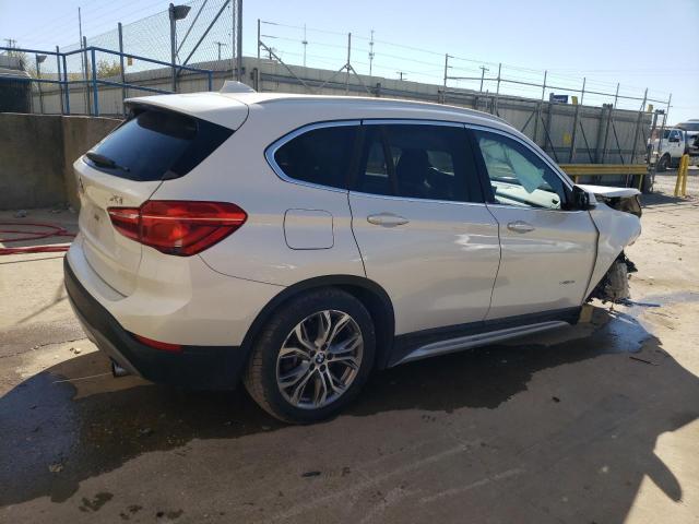 Photo 2 VIN: WBXHT3C34H5F75000 - BMW X1 