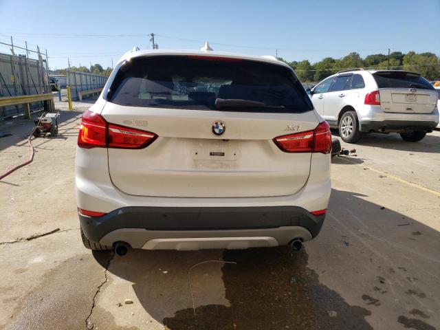 Photo 5 VIN: WBXHT3C34H5F75000 - BMW X1 