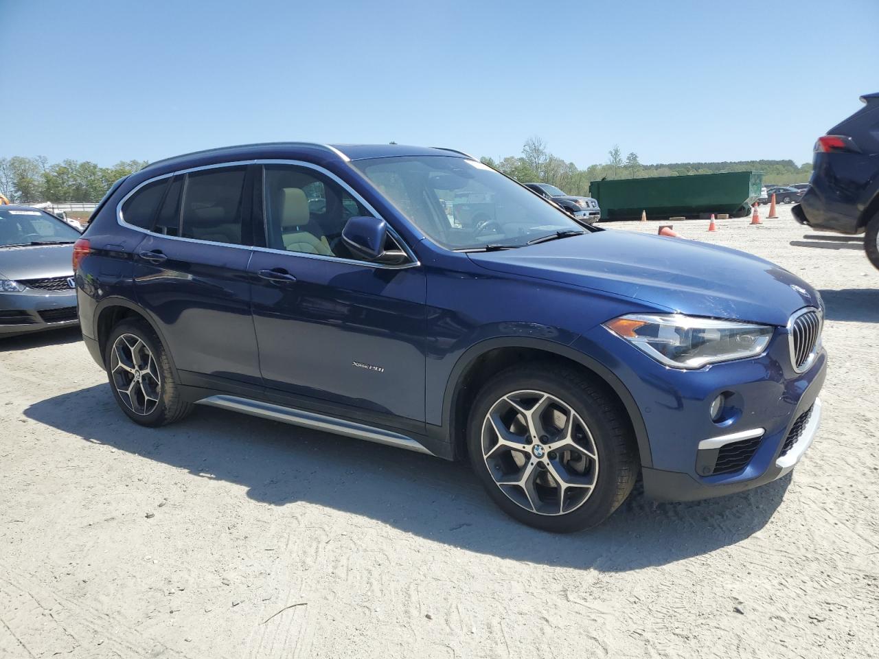 Photo 4 VIN: WBXHT3C34H5F75417 - BMW X1 