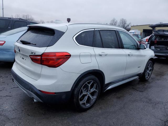 Photo 2 VIN: WBXHT3C34H5F79385 - BMW X1 