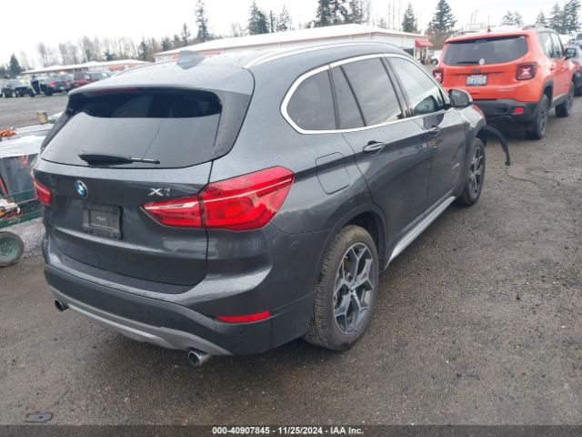 Photo 3 VIN: WBXHT3C34H5F79516 - BMW X1 