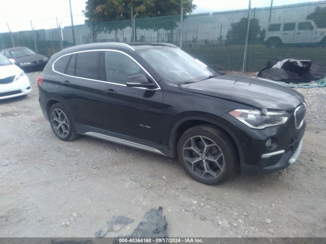 Photo 0 VIN: WBXHT3C34H5F79984 - BMW X1 