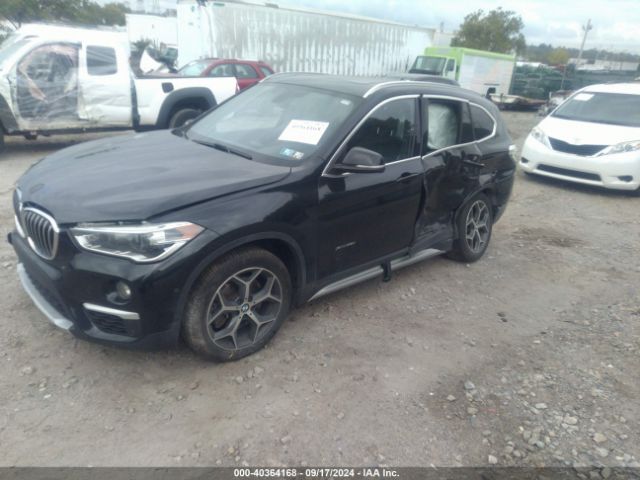 Photo 1 VIN: WBXHT3C34H5F79984 - BMW X1 