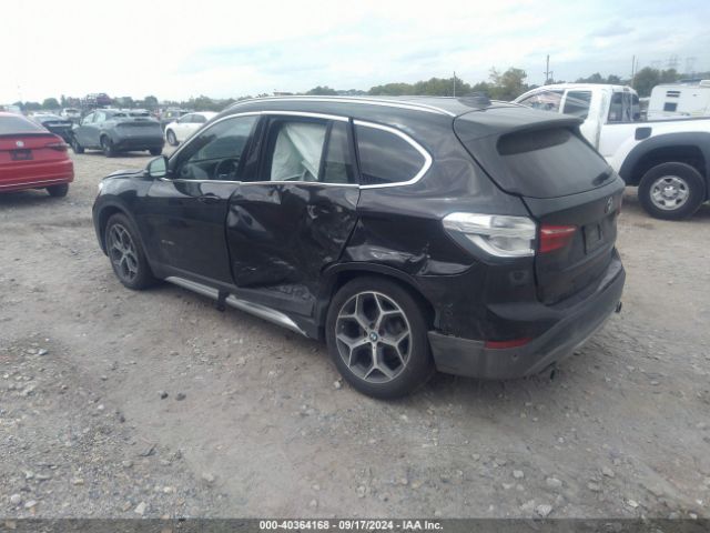 Photo 2 VIN: WBXHT3C34H5F79984 - BMW X1 