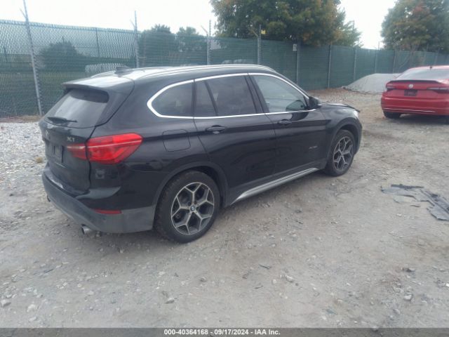 Photo 3 VIN: WBXHT3C34H5F79984 - BMW X1 