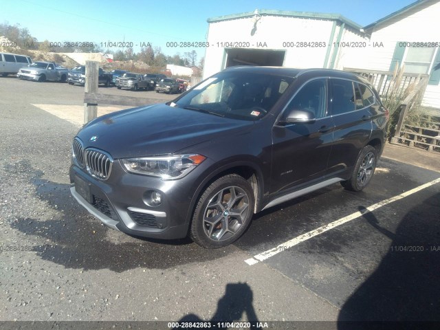 Photo 1 VIN: WBXHT3C34H5F81038 - BMW X1 